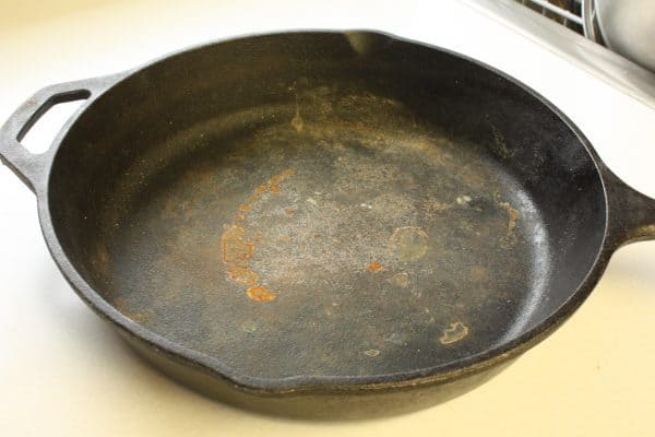 a rusty cast iron skillet to show cleaning a cast iron pan