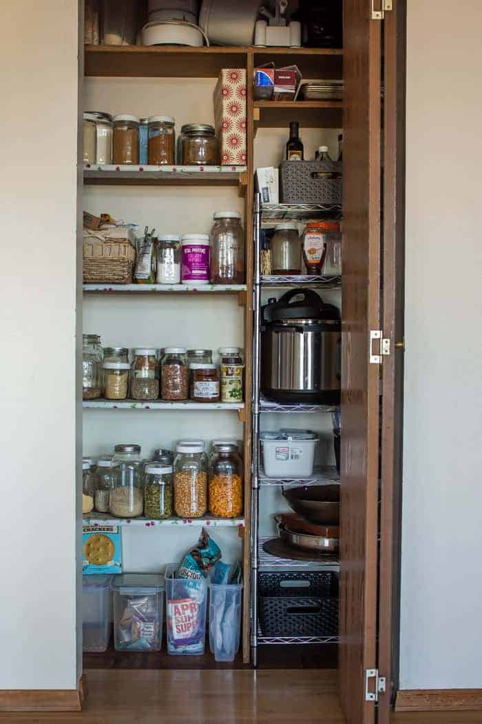 a pantry stocked with mason jars and other essential ingredients