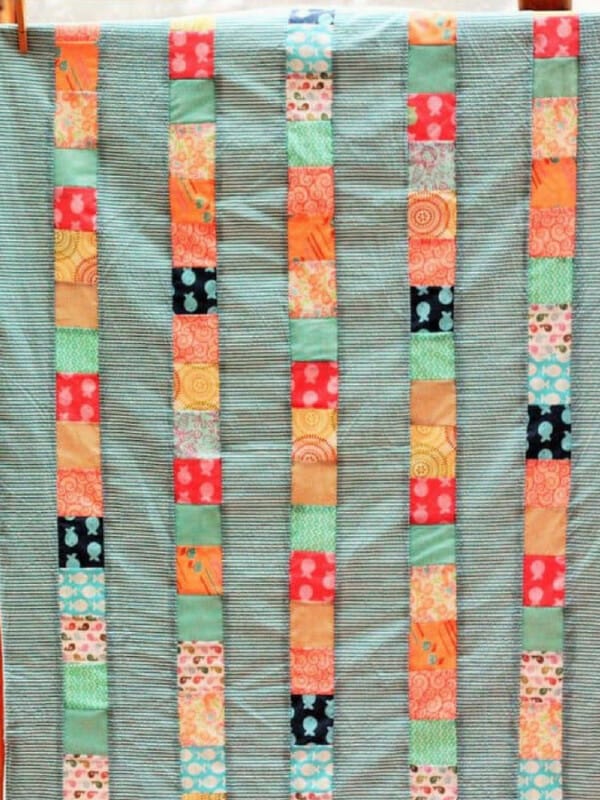 a beautiful quilt made during a tutorial on simple beginner quilts