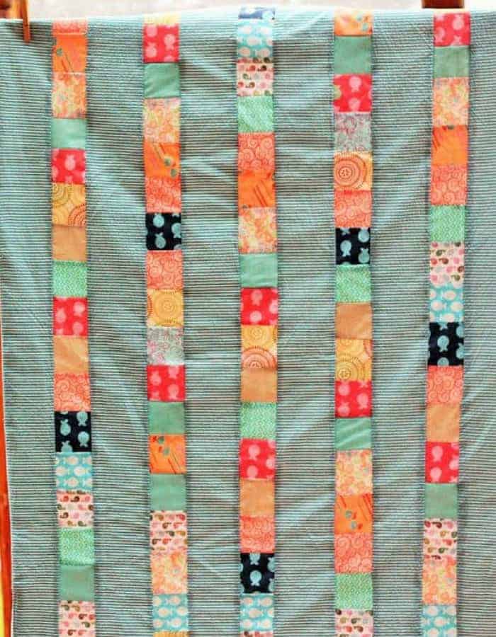 a beautiful quilt made during a tutorial on simple beginner quilts