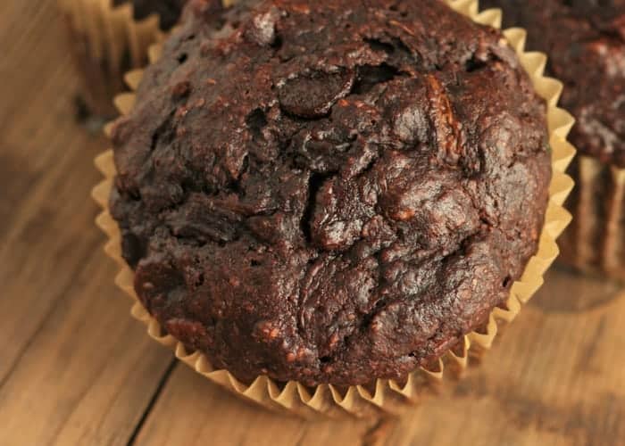 Close up of a double-chocolate zucchini muffin