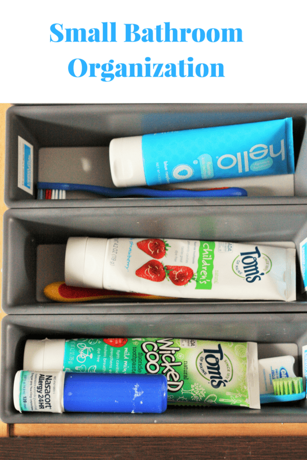 Small bathroom organization solutions for toothbrush storage. A post on how to organize a small bathroom to free up valuable counter space.