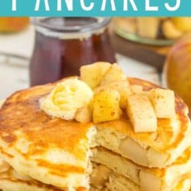 A stack of healthy apple pie pancakes with a slice cut out