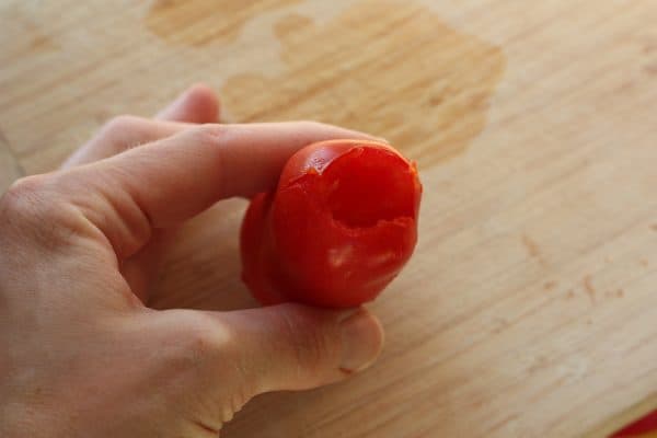 a tomato with the blossom end removed.
