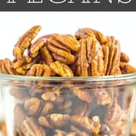 A glass bowl of stovetop candied pecans