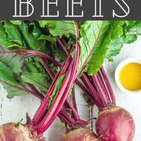 A bunch of beets with olive oil on a white board