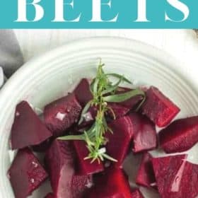 A plate of steamed beets topped with tarragon and flaky sea salt