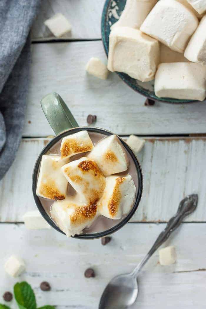 roasted paleo marshmallows in a mug of hot cocoa
