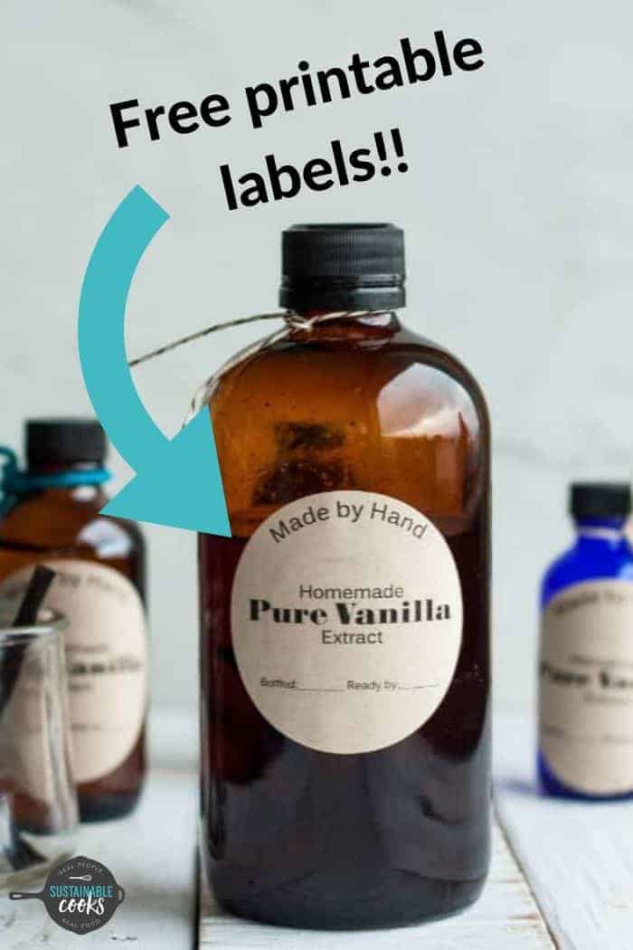 bottles of vanilla extract on a white board.