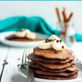a stack of gluten-free chocolate chip banana pancakes on a plate