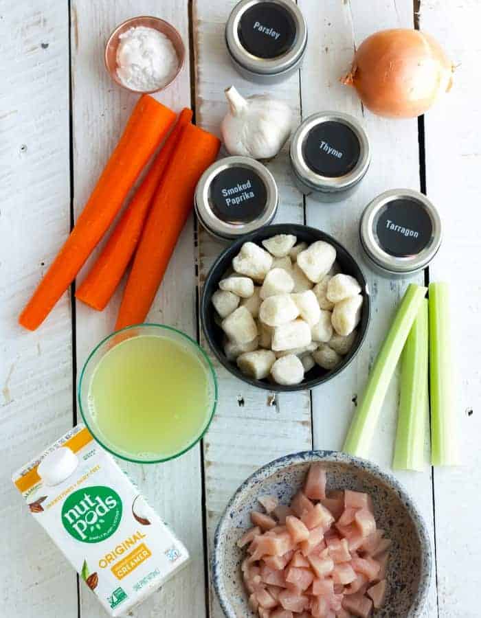 carrots, spices, chicken, gnocchi, and other ingredients for dairy-free chicken and gnocchi soup