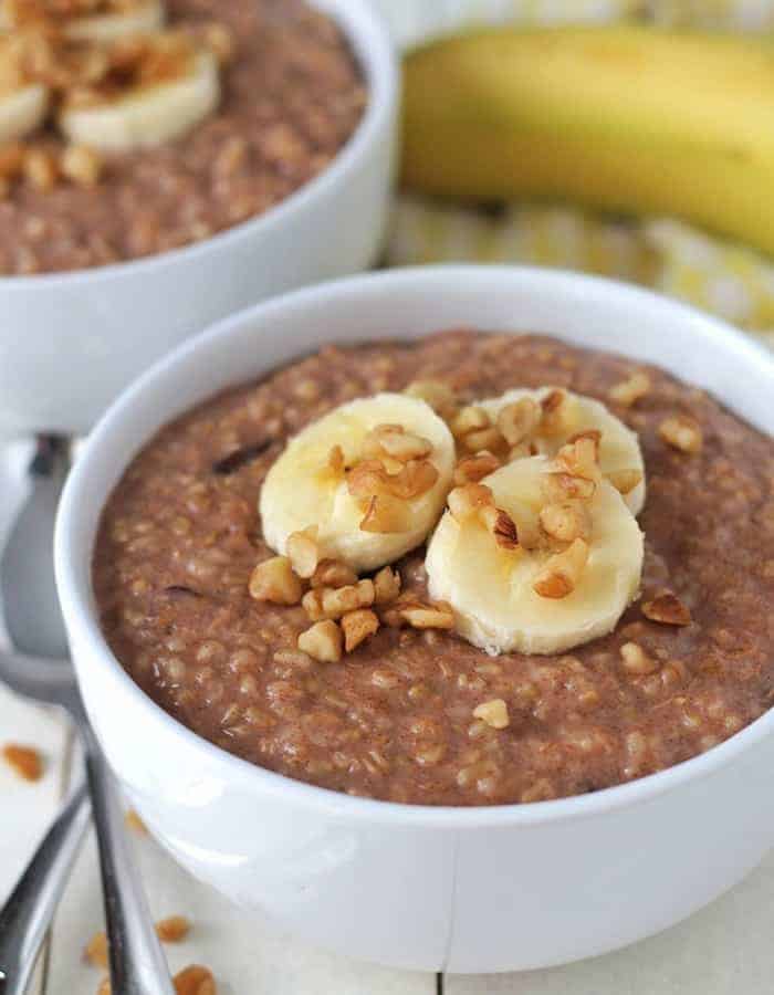 21 healthy and delicious Easy Instant Pot Recipes For Beginners to help you learn to make amazing quick and simple meals. Tasty dinner, soup, breakfast, and other recipes to get you started on the road to Instant Pot expert. #sustainablecooks #instantpotbeginner #easyinstantpot instant pot banana oatmeal in a bowl topped with bananas