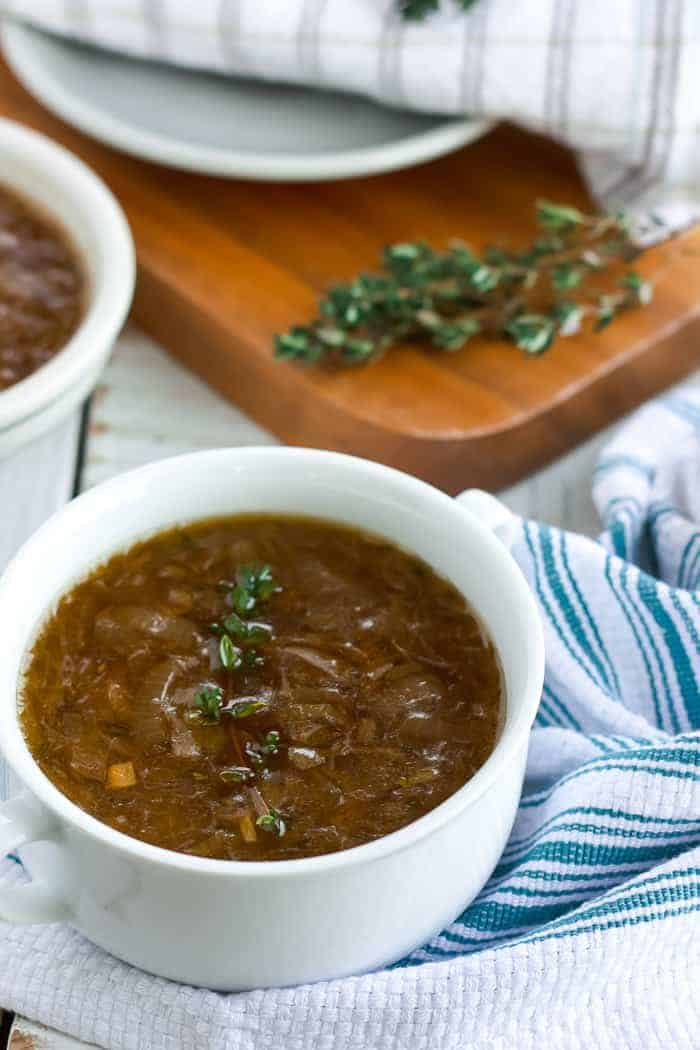 Two bowls of whole30 + paleo french onion soup with thyme