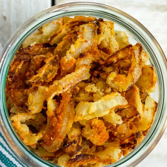 a close up photo of a bowl of gluten-free fried onions