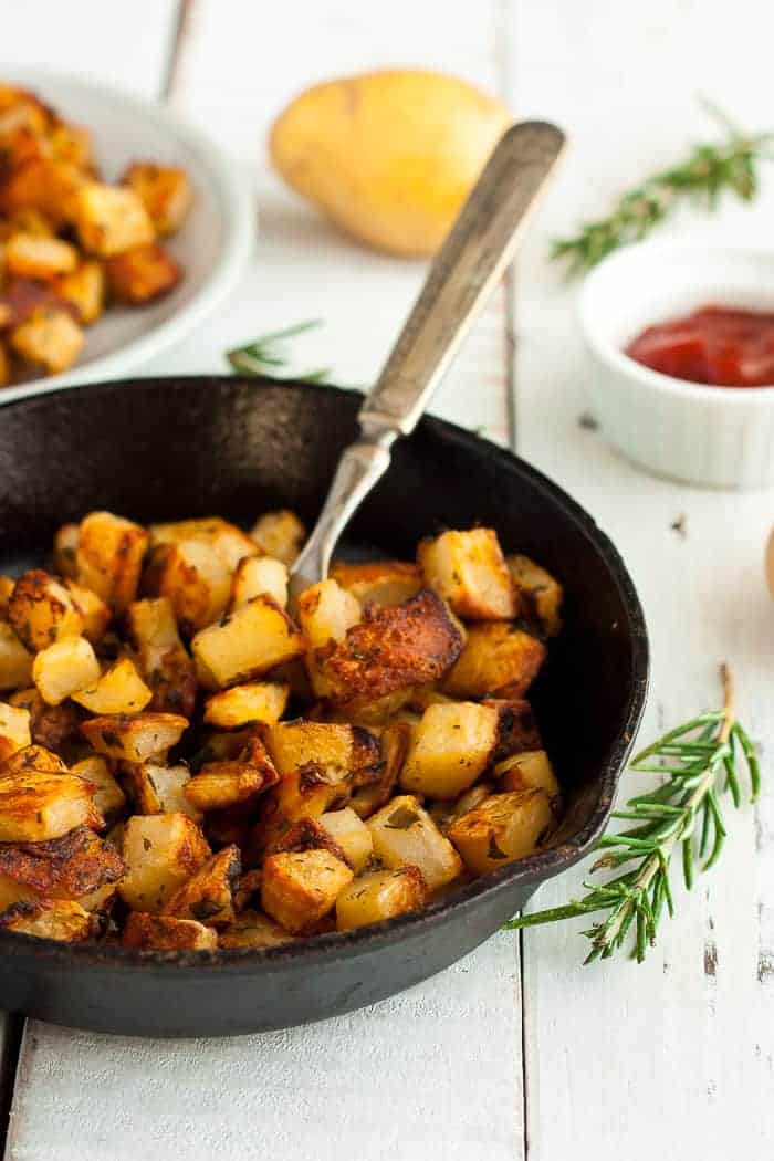a skillet of whole30 fried potatoes with rosemary