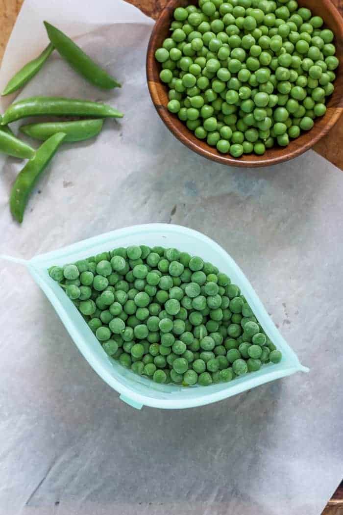 frozen peas in a silicone freezer bag