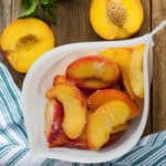 a silicone bag with frozen peach slices