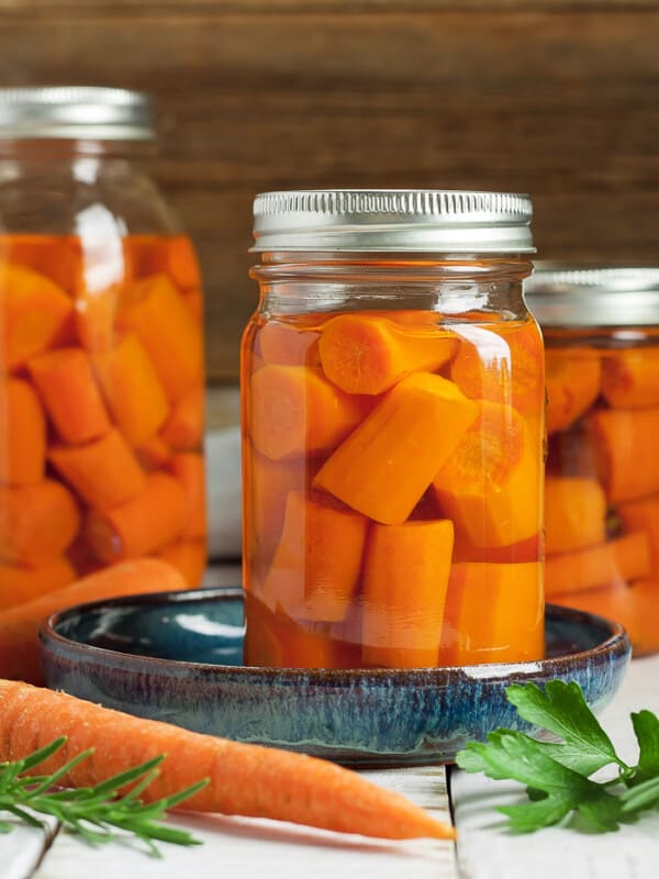 3 canning jars of canned carrots