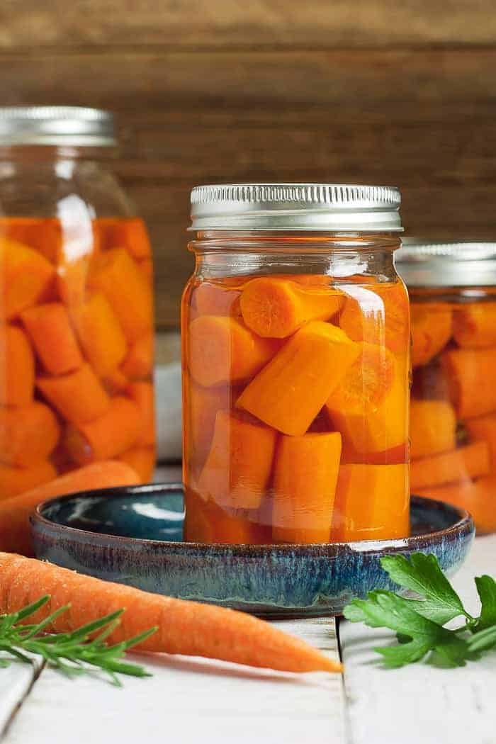3 canning jars of canned carrots