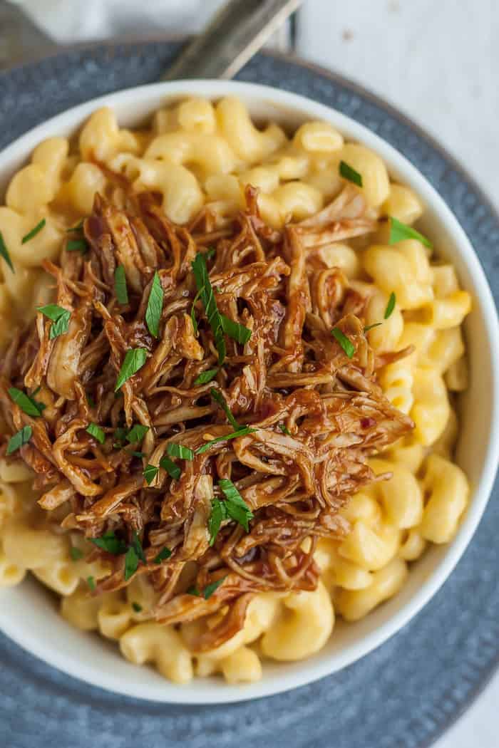 a bowl of bbq chicken mac and cheese
