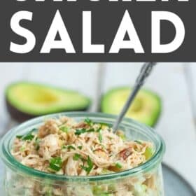 a glass jar full of whole30 chicken salad topped with parsley
