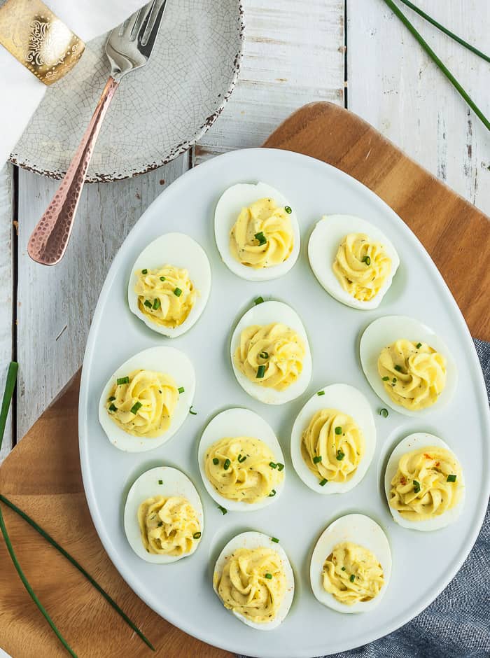 an egg-shaped platter with deviled eggs.