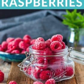 frozen raspberries in a glass jar