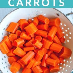 Chopped carrots in a white strainer