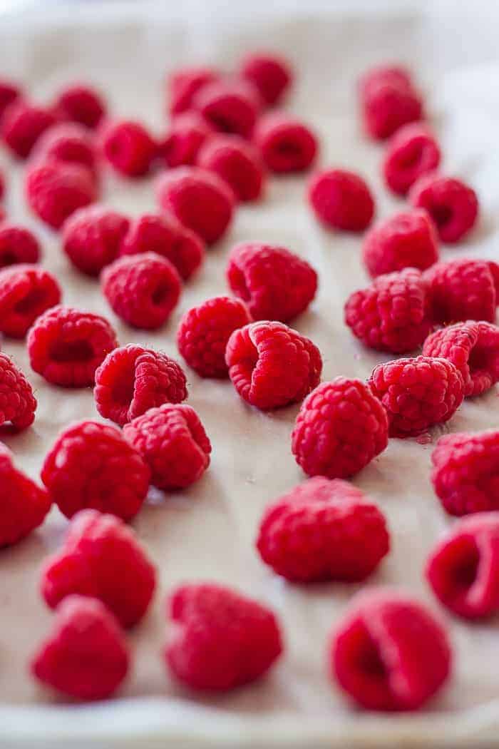 a tray of frozen raspberries