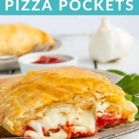 A pizza pocket cut in half with gooey mozzarella cheese