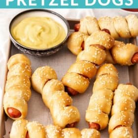 A tray of pretzel wrapped hot dogs