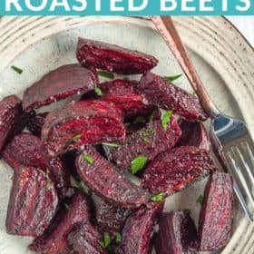 Air fryer roasted beets on a tan plate with a fork