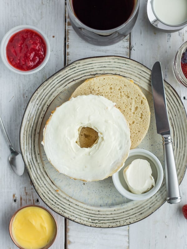 a sliced bagel on a plate