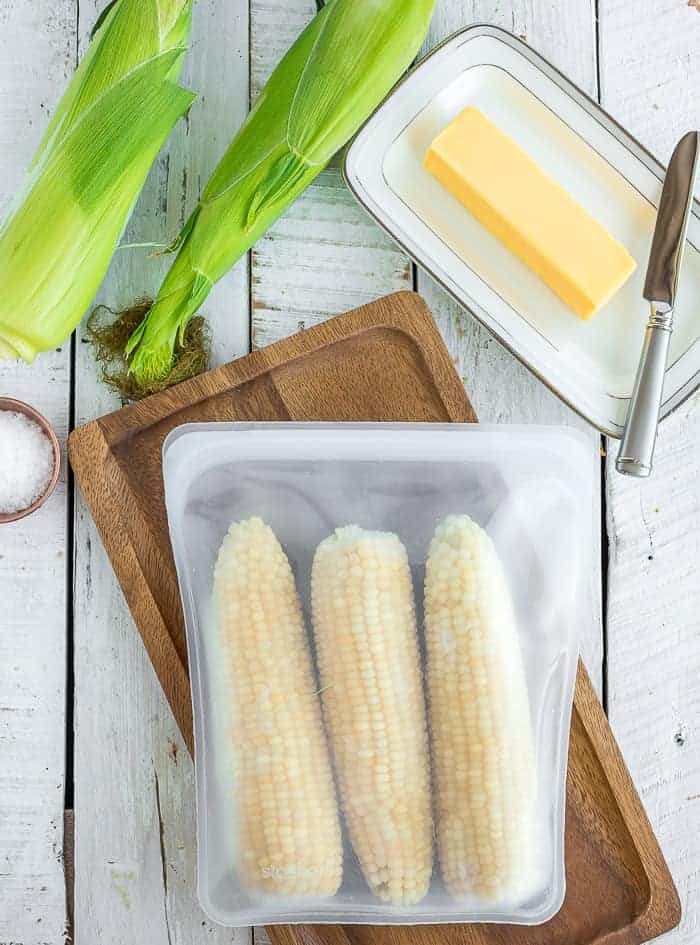 frozen ears of corn in a silicone zipper bag