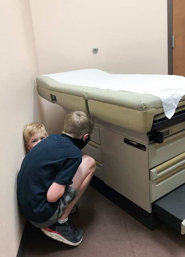 2 boys hiding in a doctor's office