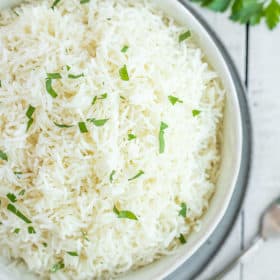 a bowl of instant pot basmati rice topped with parsley