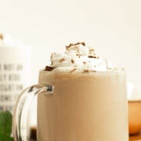 a mug of hot chocolate topped with whipped cream