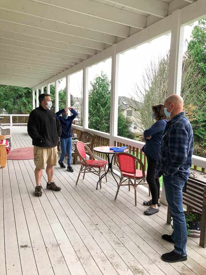 people standing on a deck