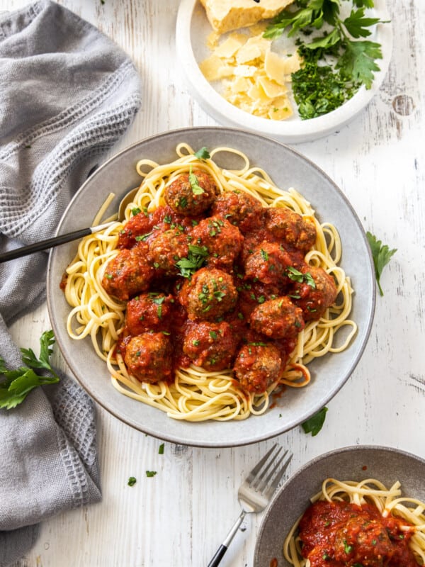 a plate with spaghetti topped with air fryer meatballs