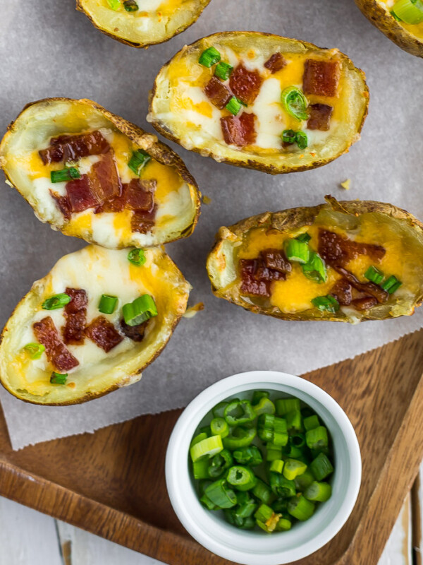 crispy potato skins topped with green onions and bacon