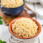 Two bowls of Instant Pot brown rice on a white board