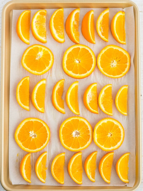 Frozen orange slices on a baking sheet