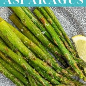 roasted frozen asparagus on a grey plate