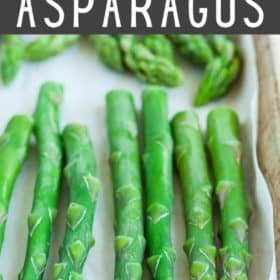 frozen asparagus on a baking sheet