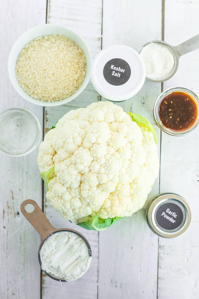 Ingredients on a white board for making cauliflower tempura