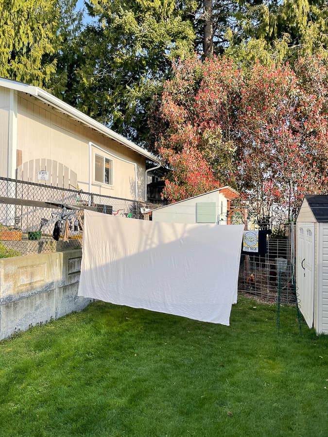 white sheets on a clothesline