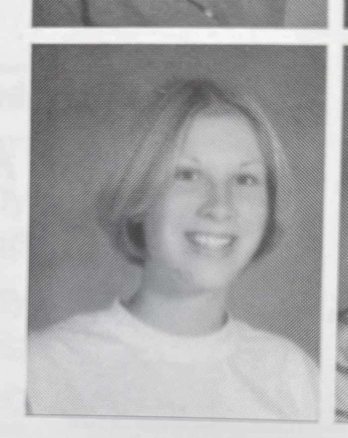 a blonde girl in a yearbook photo