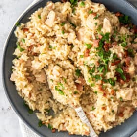 a bowl of instant pot risotto topped with parsley