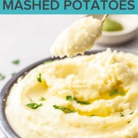 a spoonful of mashed potatoes over a bowl