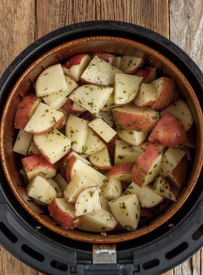 cubed potatoes in an air fryer.